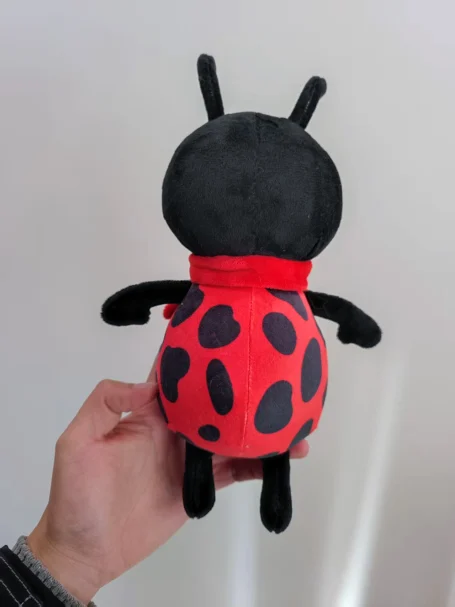 Fleckie Plüschtier von hinten